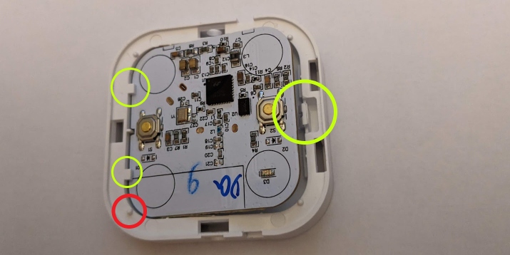 Parts holding the PCB in place (lime-green), guide post (red)