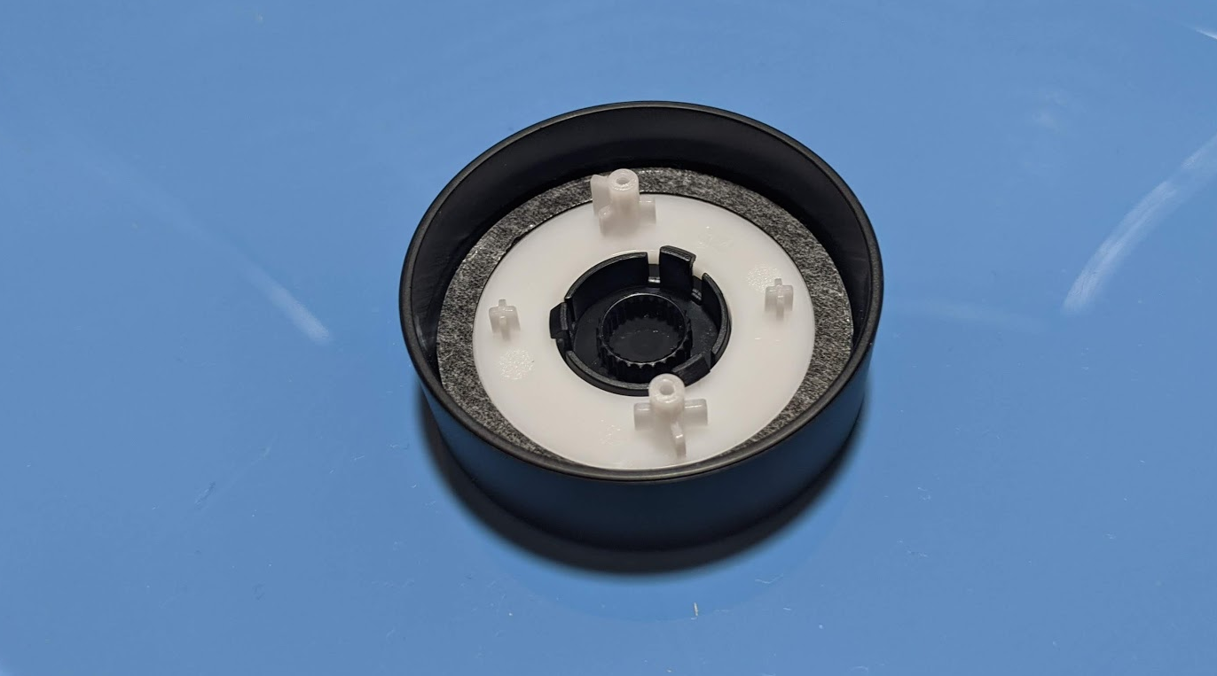 Fitting ABS disk into cover