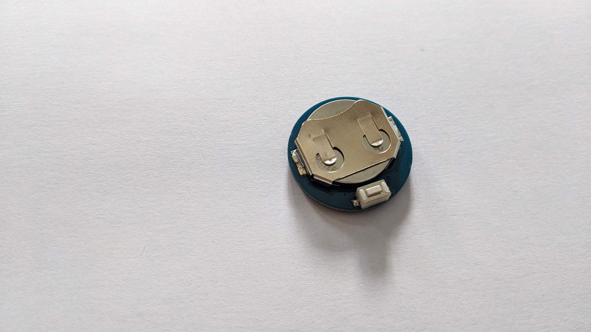 Back of PCB with button and coin cell holder